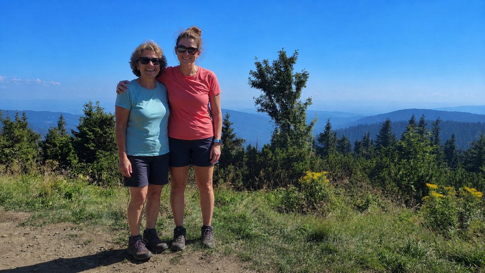 Two older women enjoying a hike outdoors